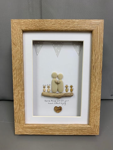 2 People, 2 Cats and 2 Rabbits pebble picture