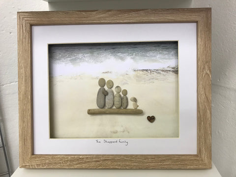 Family 4 and dog on the beach pebble picture in a stand up frame