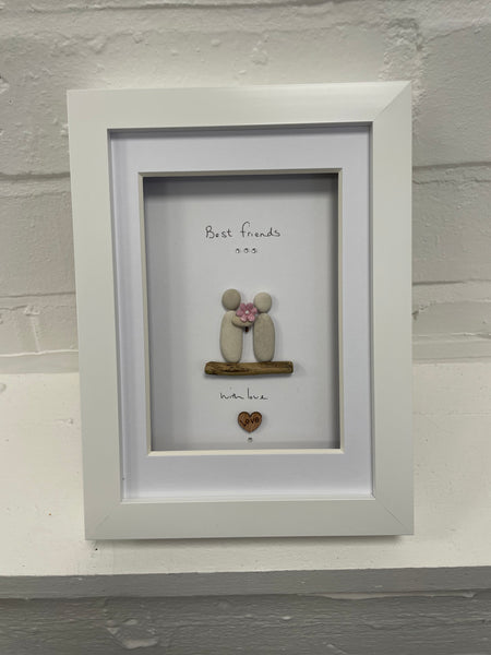 Special Friends design, 2 pebble people holding a flower