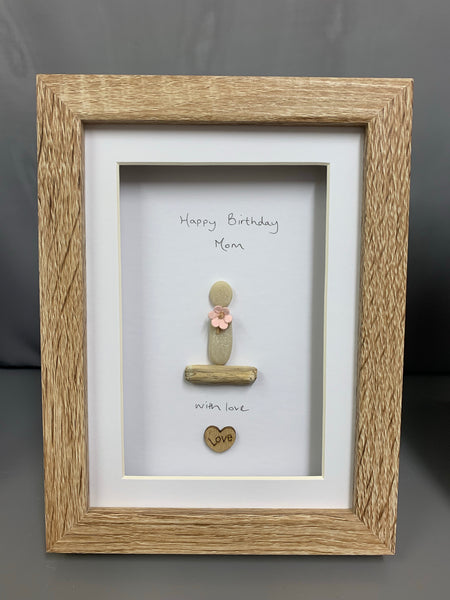Happy Birthday Day design, Pebble person holding a flower