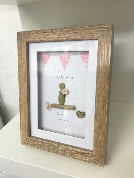 Happy Retirement Pebble Picture in a stand up frame, comes in 2 colours